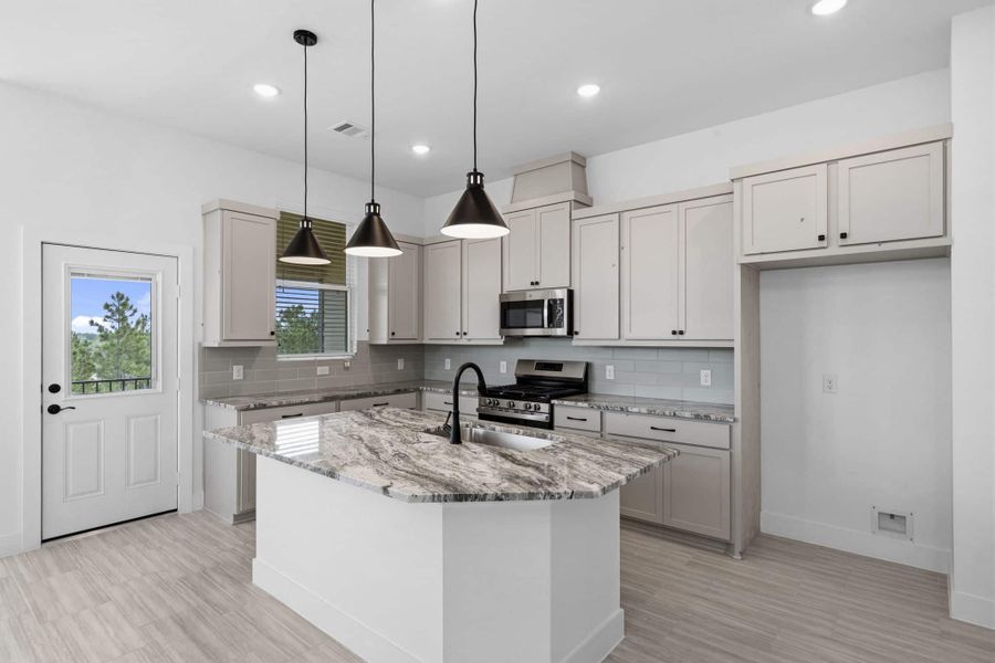 Furnished interior view inside a new home in Bridgeland, Cypress (Image 10).