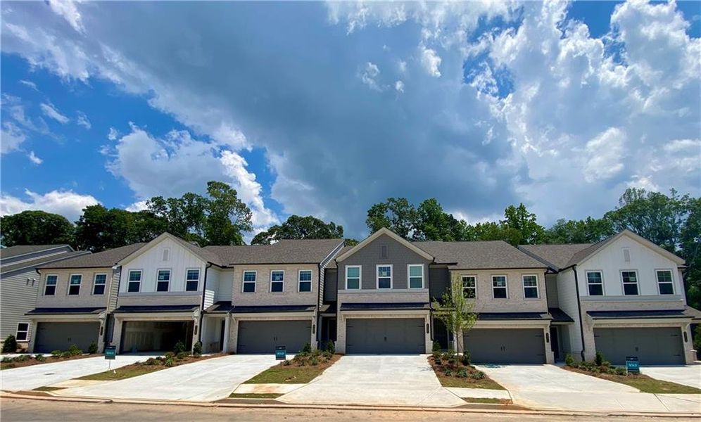 Front exterior of a new home in Eastlyn Crossing, Flowery Branch, GA, highlighting curb appeal (Image 20).