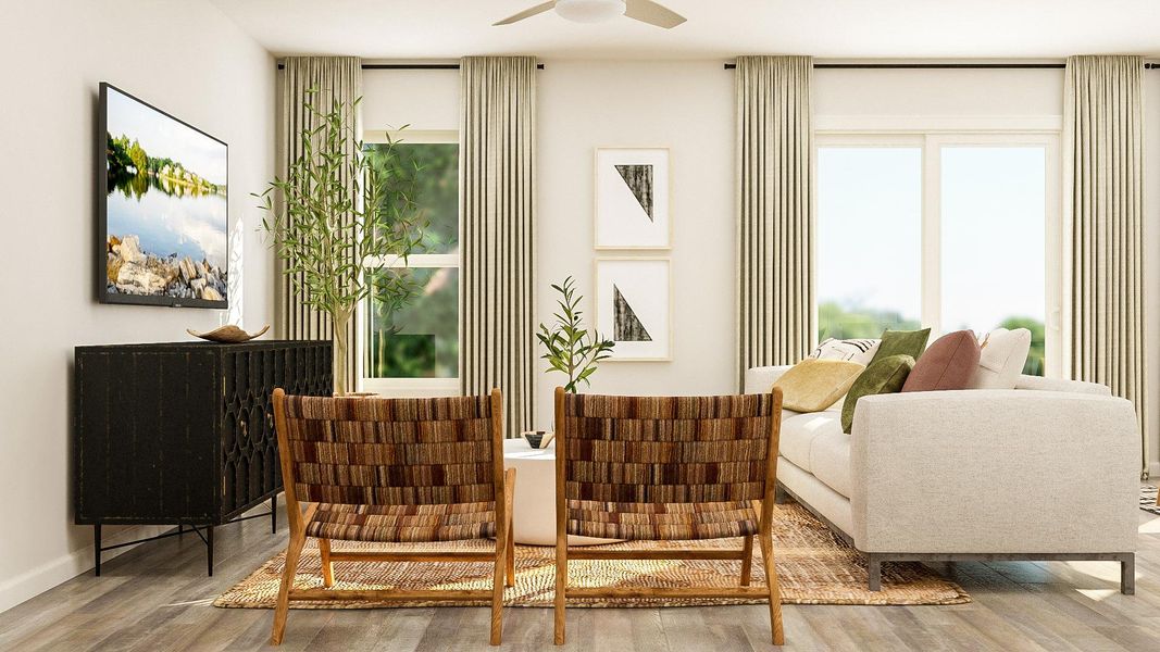 A living room with a couch and chairs. A living room with a couch and chairs.