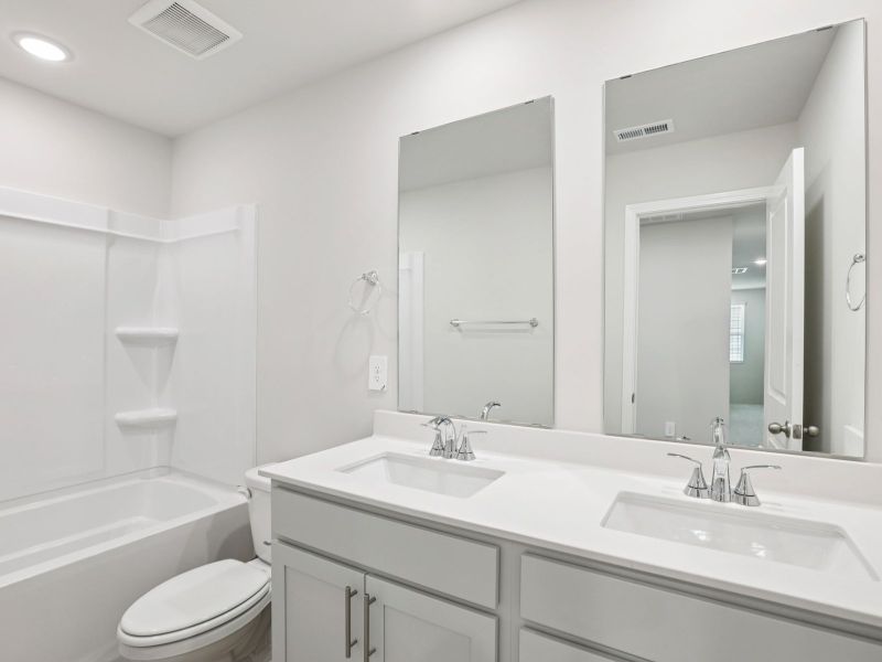 Furnished interior view inside a new home in River Glen, Angier (Image 7).