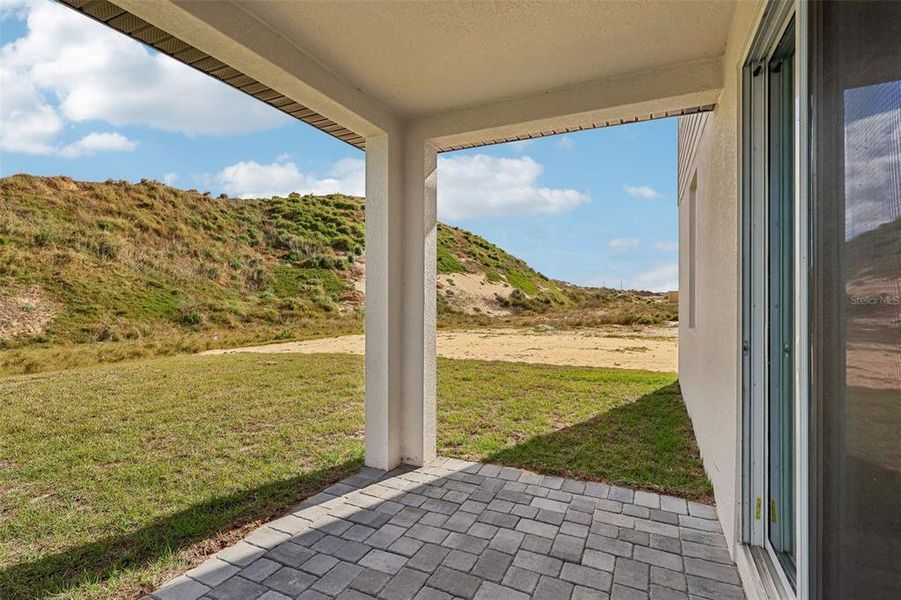 Exterior details and patio area of a home in Crosswinds - Signature Series, Haines City (Image 19).