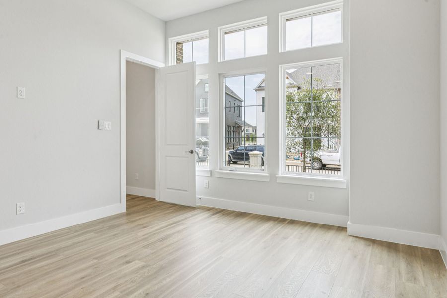 Representative unfurnished interior of a home built from the Hamilton by Centre Living Homes in Newman Village Townhomes, Frisco (Image 26).