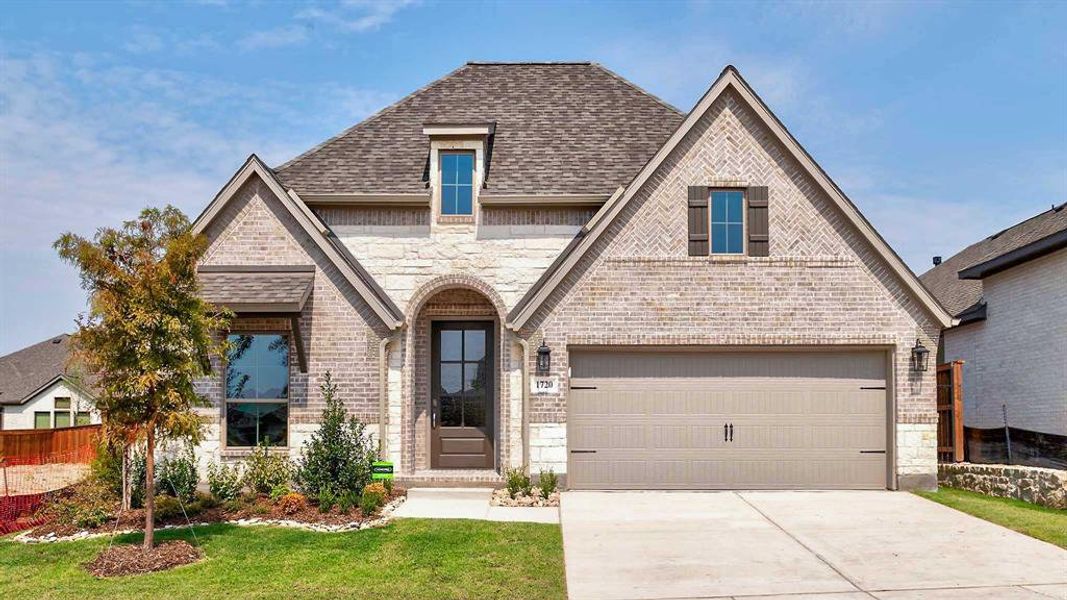 Front exterior of a new home in Hillstead 50', Lavon, TX, highlighting curb appeal (Image 1).