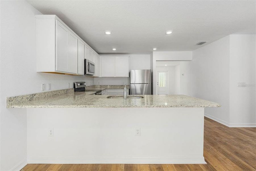 Furnished interior view inside a new home in , Port Charlotte (Image 8).