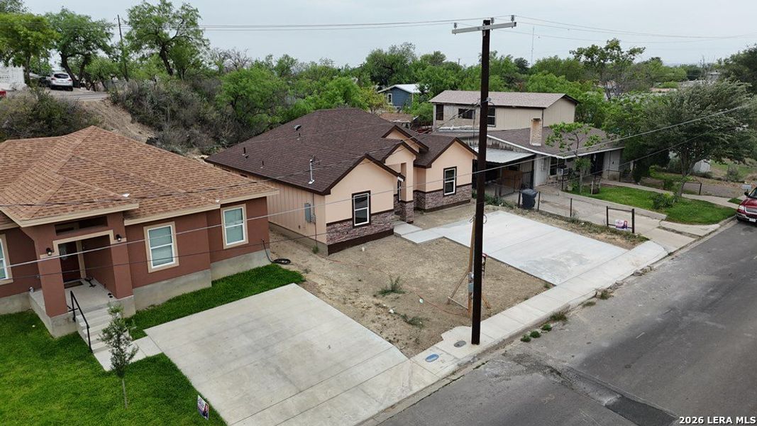 Front exterior of a new home in , Eagle Pass, TX, highlighting curb appeal (Image 18). Front exterior of a new home in , Eagle Pass, TX, highlighting curb appeal (Image 18).