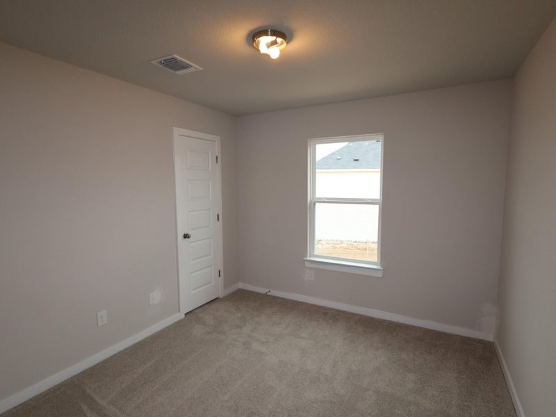 Spacious, unfurnished interior of a new home in Heritage, Dripping Springs (Image 10). Spacious, unfurnished interior of a new home in Heritage, Dripping Springs (Image 10).