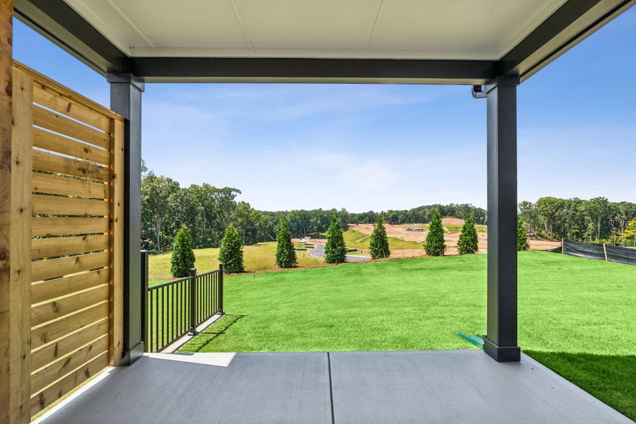 Exterior details and patio area of a home in Lanier Landing - Reserve Collection, Gainesville (Image 4).