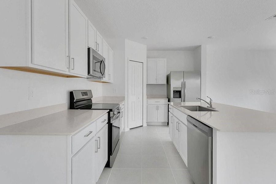 Furnished interior view inside a new home in Peace Creek Reserve, Winter Haven (Image 7).