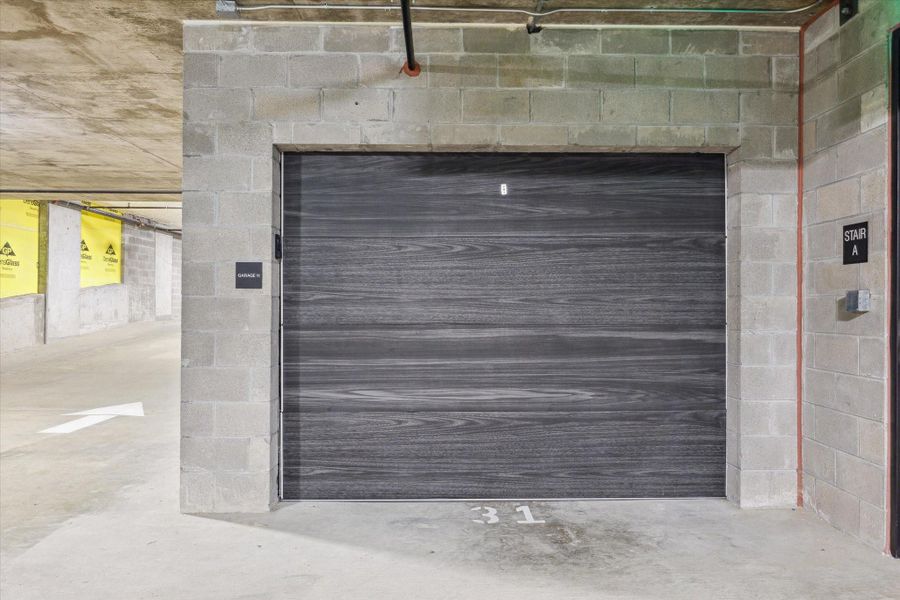 This is one of the two private garages for this penthouse unit. They each house a full size car with room for additional storage. The elevator with direct access to their home is located around the corner. This is one of the two private garages for this penthouse unit. They each house a full size car with room for additional storage. The elevator with direct access to their home is located around the corner.