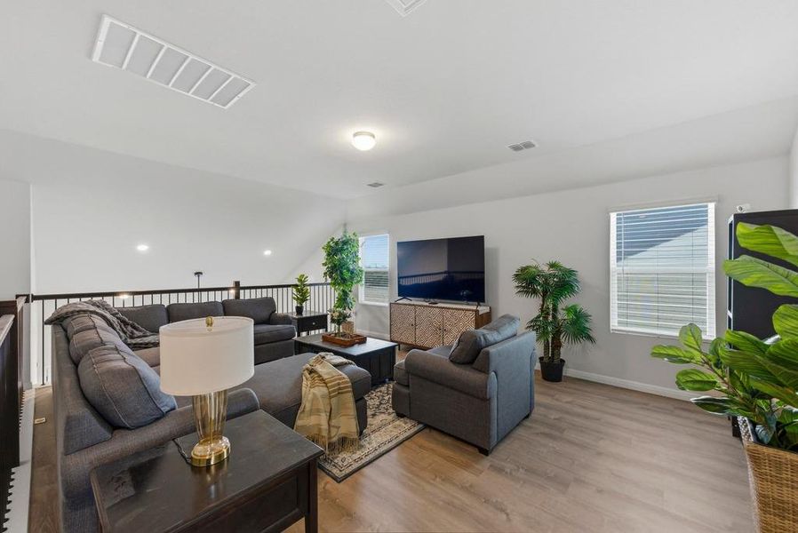 Bonus room upstairs open to below.