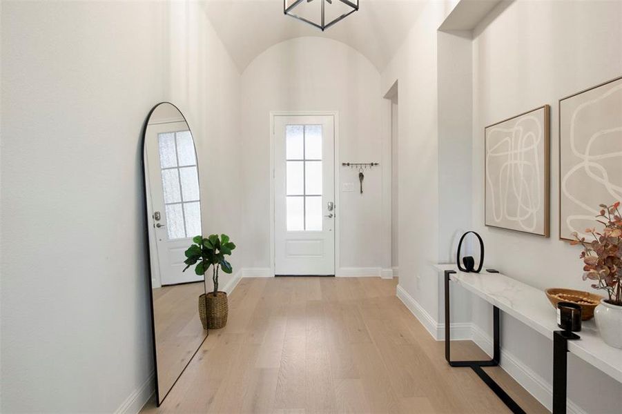 Gorgeous engineered hardwood flooring and high ceilings!