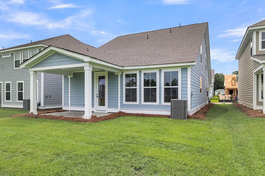 Front exterior of a new home in High Point at Foxbank, Moncks Corner, SC, highlighting curb appeal (Image 30).