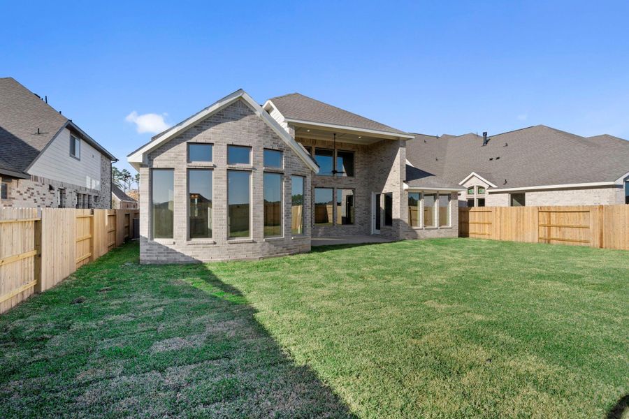 Exterior details and patio area of a home in The Meadows at Imperial Oaks 60', Conroe (Image 4).