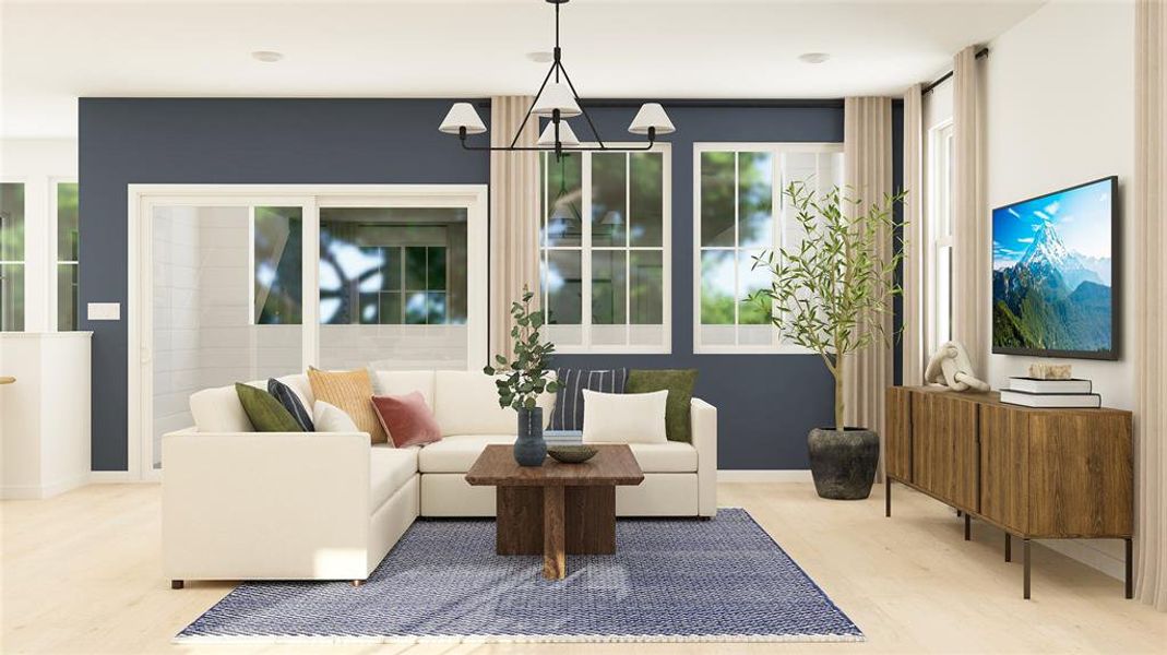 Living room featuring wood finished floors and baseboards
