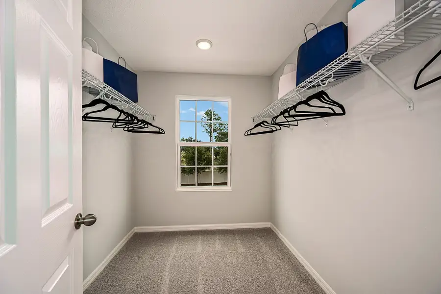 Representative unfurnished interior of a home built from the Sanibel by Risewell Homes in Preservation Pointe, Davenport (Image 14).
