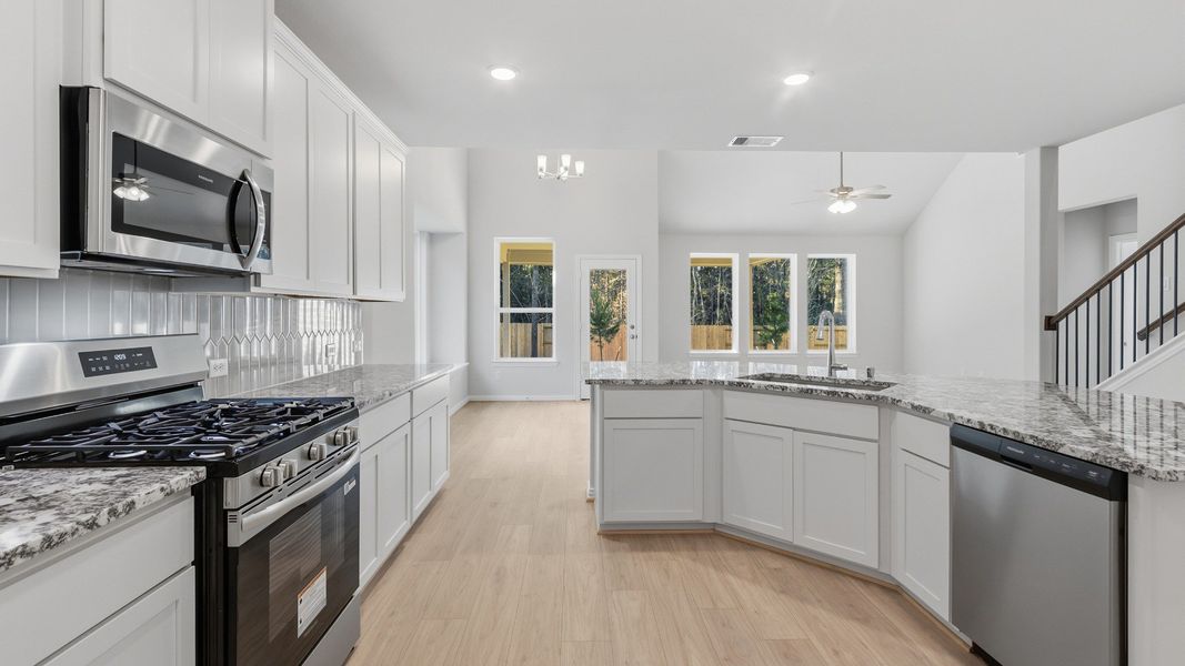 Furnished interior view inside a new home in The Woodlands Hills, Willis (Image 10).