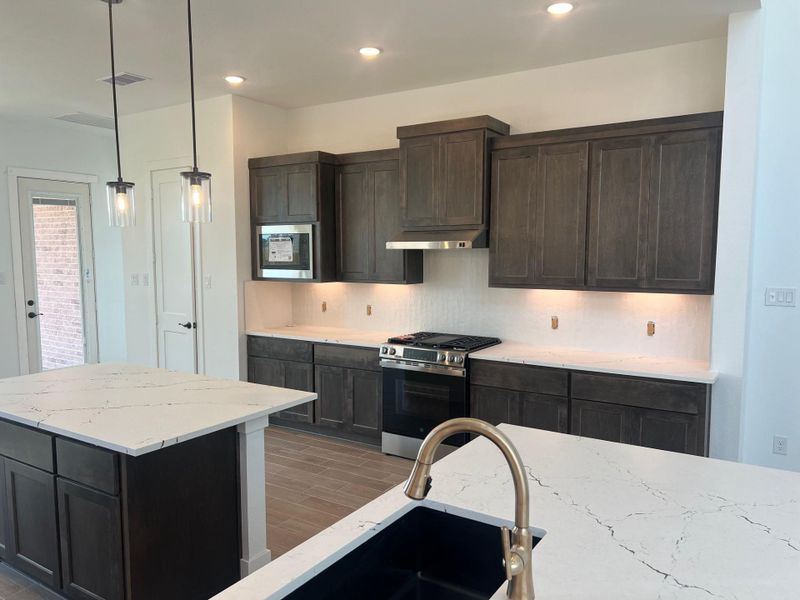 Furnished interior view inside a new home in Wood Leaf Reserve, Tomball (Image 3).