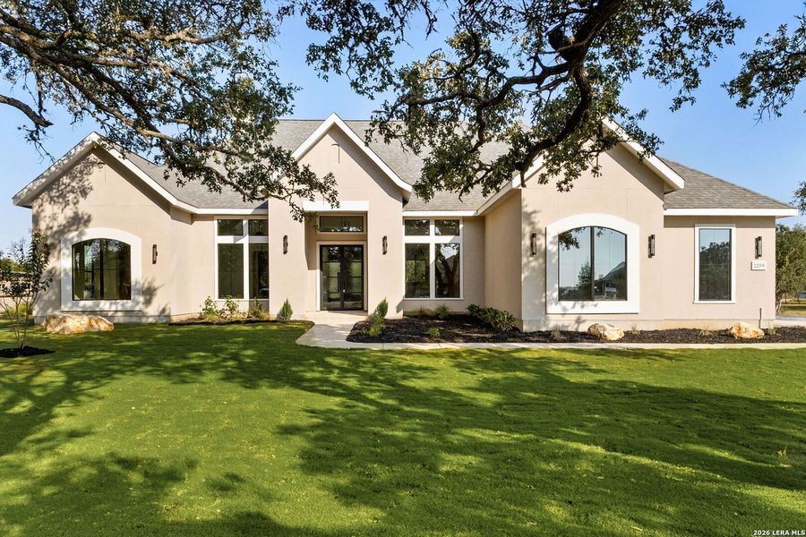 Front exterior of a new home in , Canyon Lake, TX, highlighting curb appeal (Image 1). Front exterior of a new home in , Canyon Lake, TX, highlighting curb appeal (Image 1).