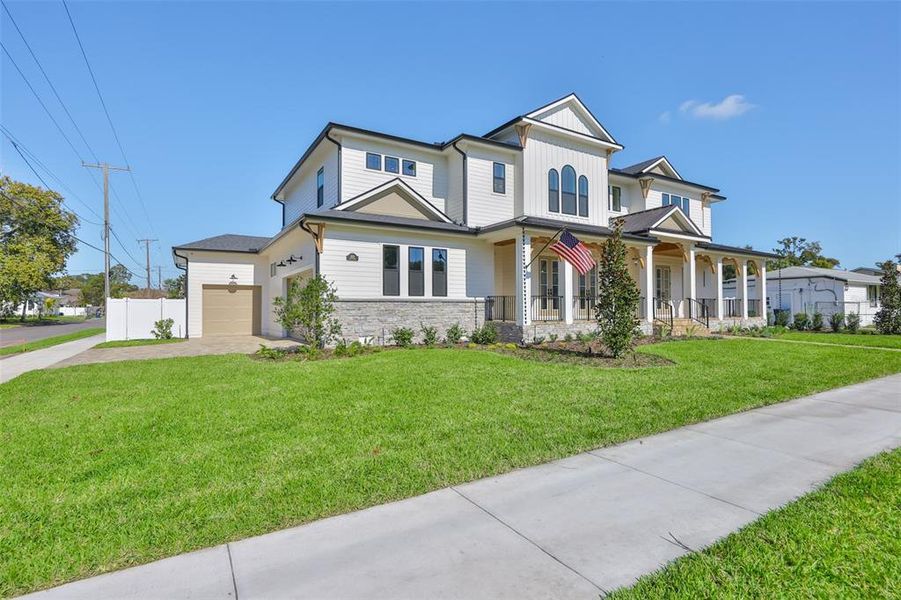 Front exterior of a new home in , Tampa, FL, highlighting curb appeal (Image 32).