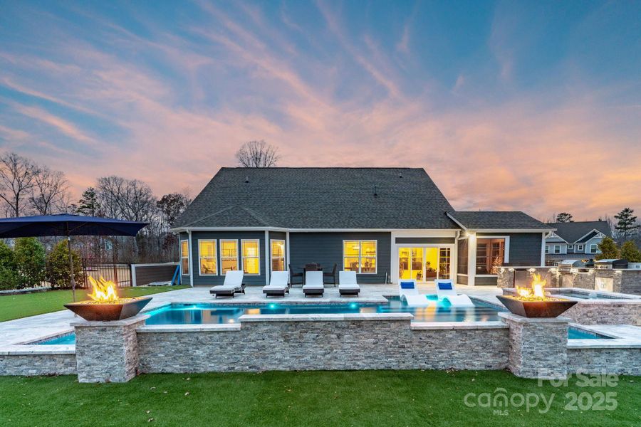 Gorgeous pool & spa surrounded by Travertine tile
