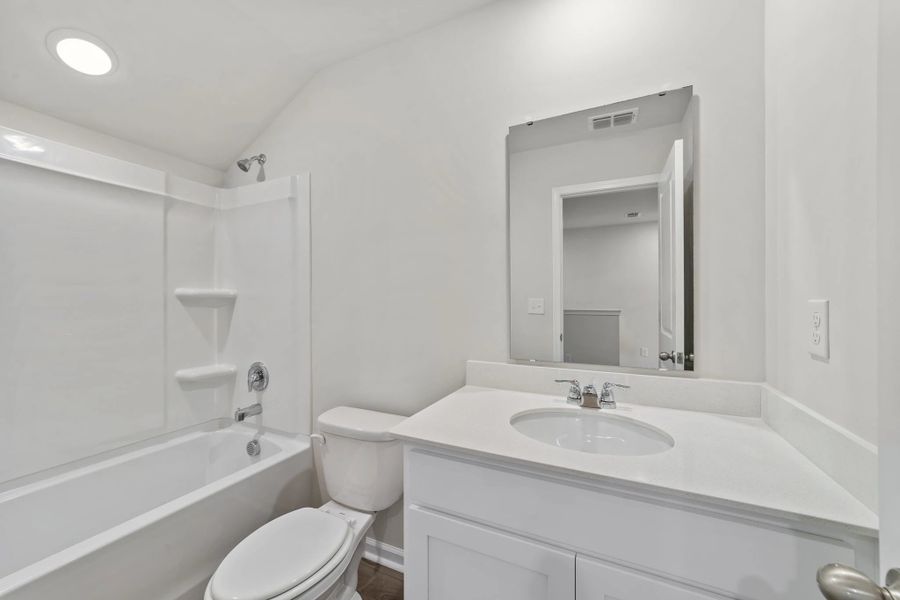 Furnished interior view inside a new home in Blue Heron Retreat, Little River (Image 11).