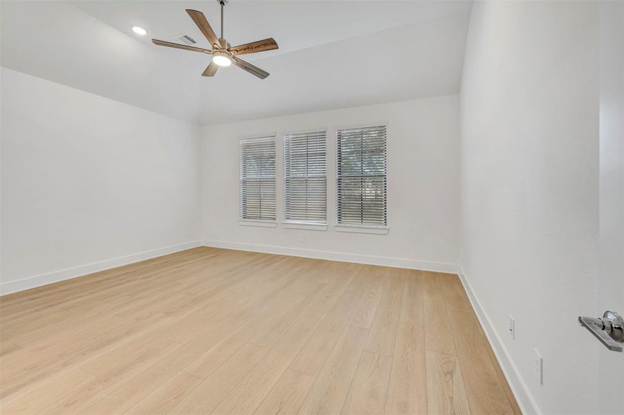 Spacious, unfurnished interior of a new home in The Oaks on 6th Street, Magnolia (Image 28).