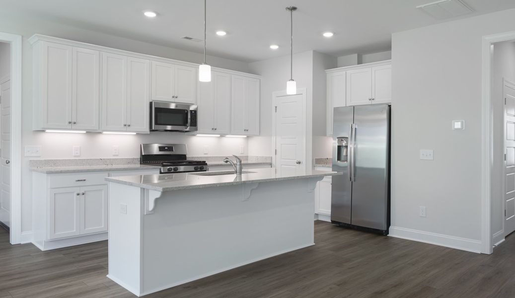 Representative furnished interior of a home built from the The McKee by Cothran Homes in Holly Ridge, Greenville (Image 6). Representative furnished interior of a home built from the The McKee by Cothran Homes in Holly Ridge, Greenville (Image 6).