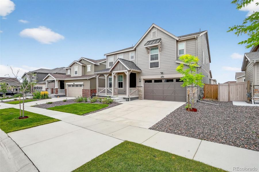Front exterior of a new home in , Parker, CO, highlighting curb appeal (Image 2).