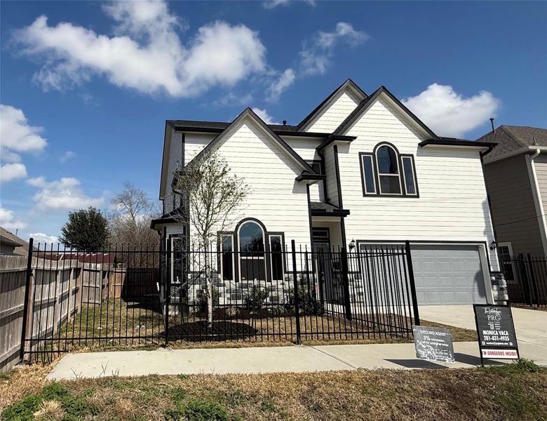 Front exterior of a new home in , Houston, TX, highlighting curb appeal (Image 2).
