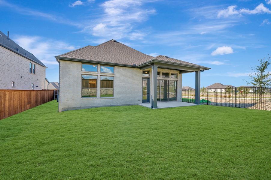 Exterior details and patio area of a home in Monterra - Gardens, Fate (Image 4).