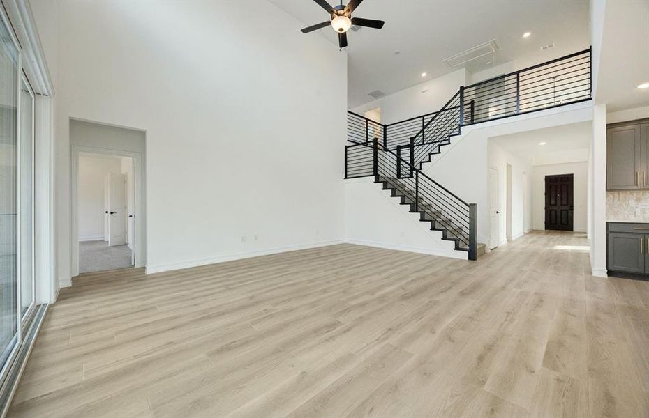 Spacious gathering room with large windows *Model Representation*