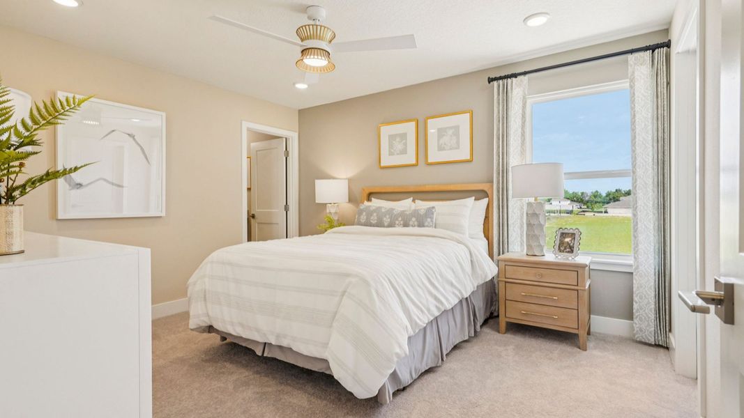 Representative furnished interior of a home built from the Sweetgum by DRB Homes in Ardisia Park, New Smyrna Beach (Image 54).