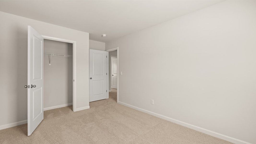 Spacious, unfurnished interior of a new home in Byrd Village, Graniteville (Image 23).