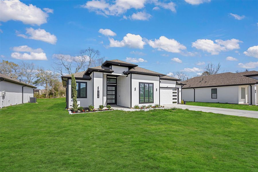 Front exterior of a new home in , Dayton, TX, highlighting curb appeal (Image 24).