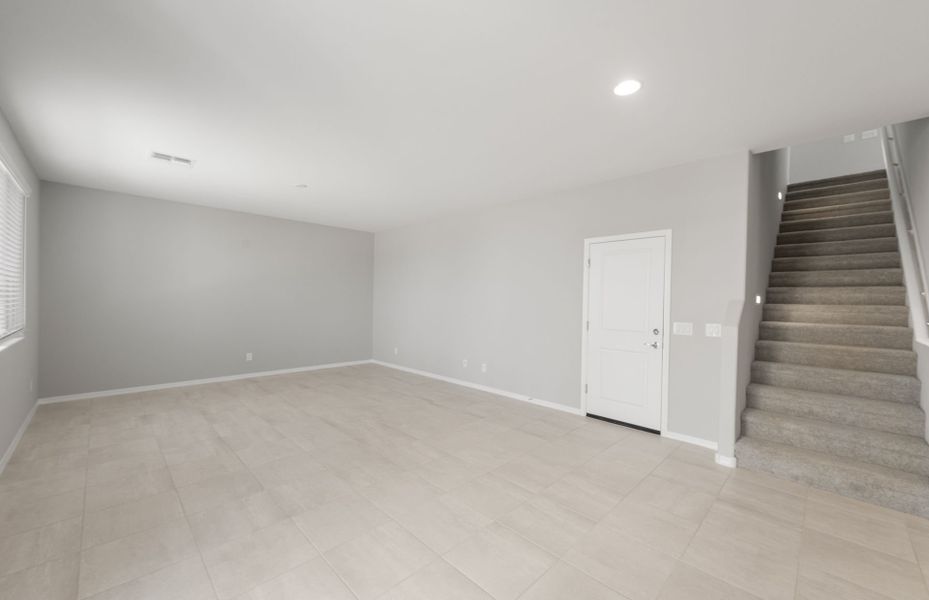 Spacious, unfurnished interior of a new home in Asante- Atrium Series, Surprise (Image 14).