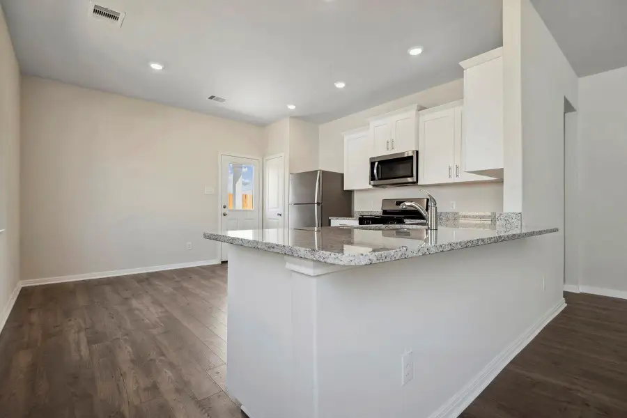 Furnished interior view inside a new home in Sweetwater Ridge, Conroe (Image 7).