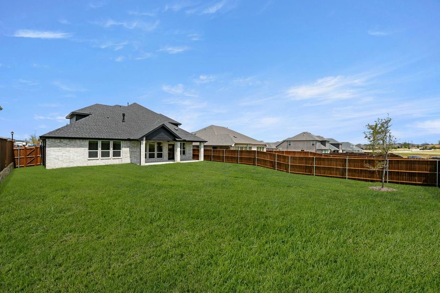 Exterior details and patio area of a home in Westside Preserve, Midlothian (Image 22).