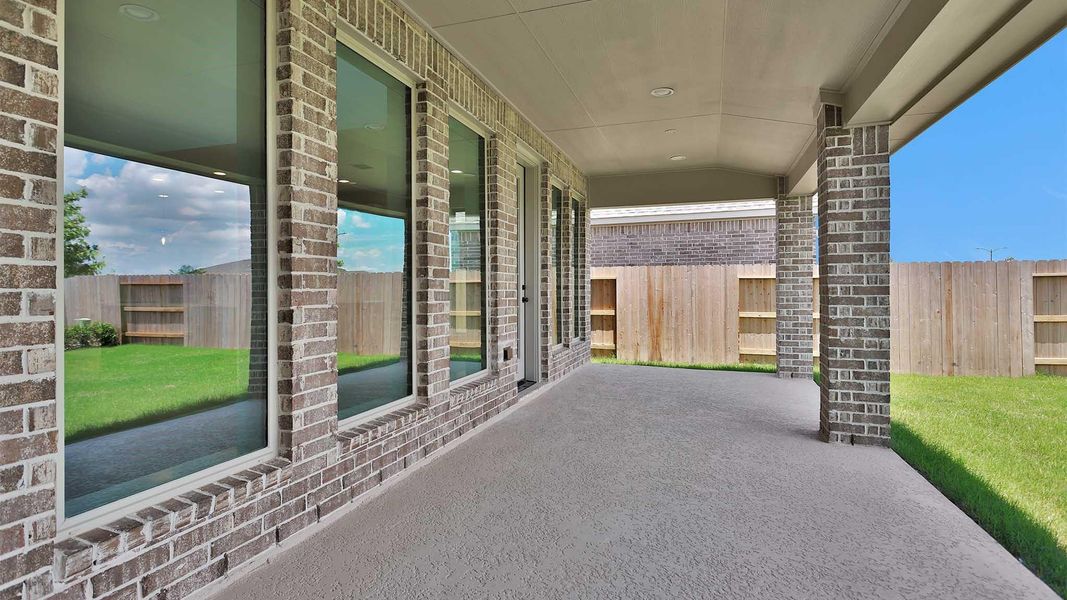Exterior details and patio area of a home in Valencia, Manvel (Image 3). Exterior details and patio area of a home in Valencia, Manvel (Image 3).