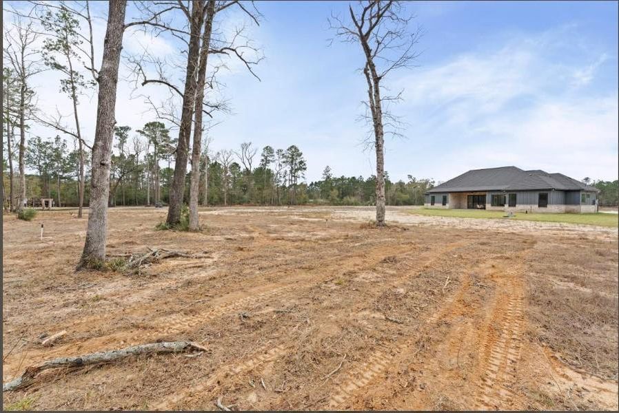 Site preparation for new homesites in , Conroe (Image 40).