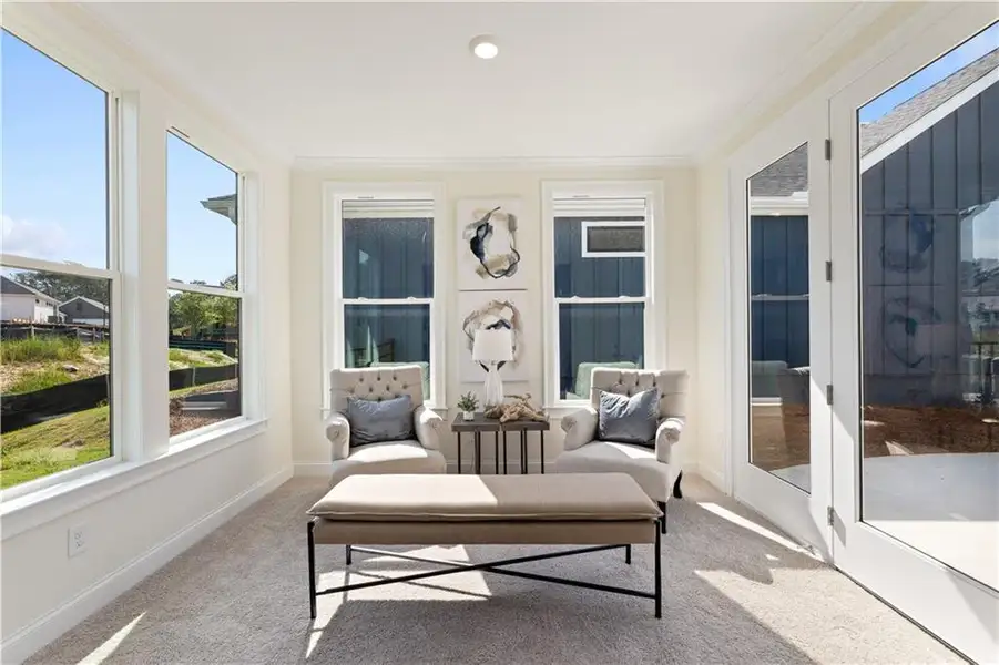 Furnished interior in a model home at The Courtyards by The Manor in Alpharetta (Image 5).