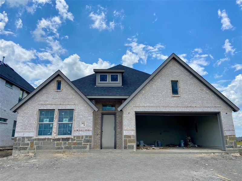 Beautiful new home under construction. Estimated completion is July. Photos are of same floor plan with same color selections.