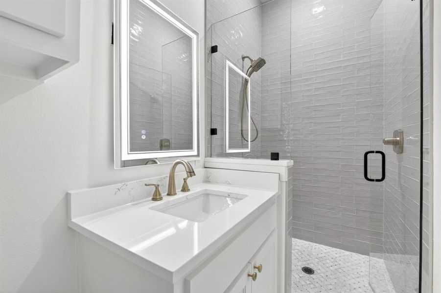 Ensuite full bath located downstairs