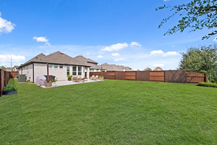 Front exterior of a new home in , Rosharon, TX, highlighting curb appeal (Image 24).