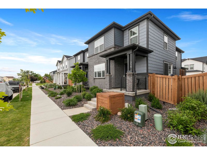 Front exterior of a new home in , Berthoud, CO, highlighting curb appeal (Image 23). Front exterior of a new home in , Berthoud, CO, highlighting curb appeal (Image 23).