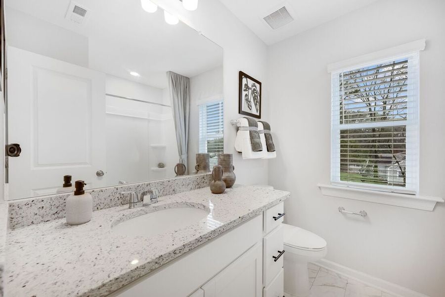 Representative furnished interior of a home built from the Cobblestone by Taylor Morrison in Buffalo Townes, Garner (Image 17).
