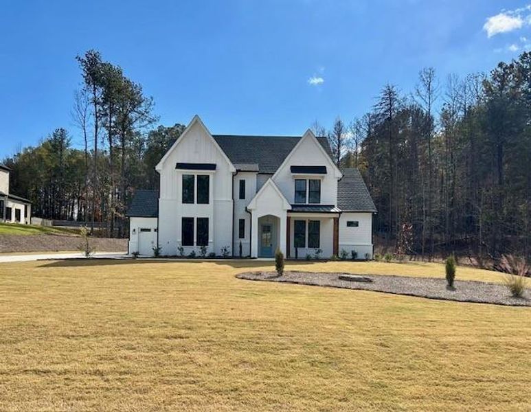 Front exterior of a new home in , Jefferson, GA, highlighting curb appeal (Image 27).