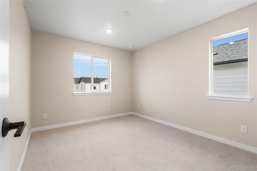 Spacious, unfurnished interior of a new home in Barefoot Village, Longmont (Image 20).