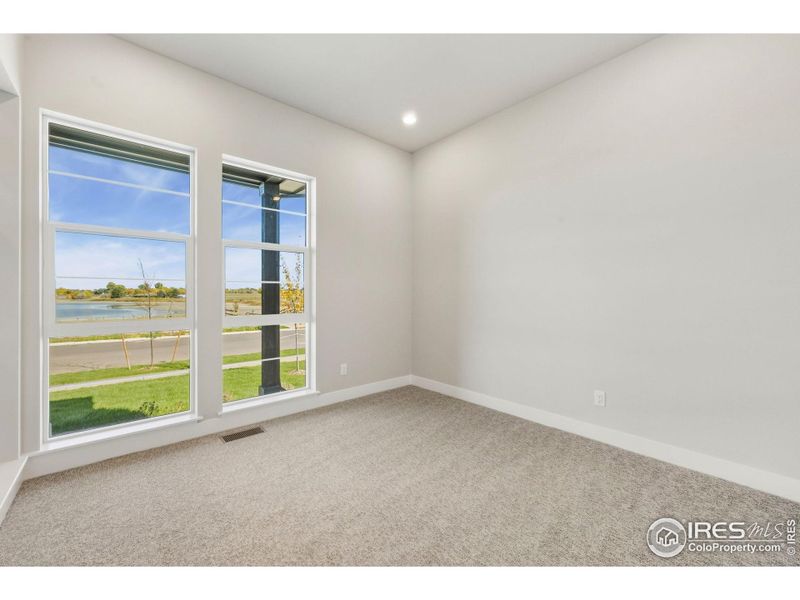 Spacious, unfurnished interior of a new home in Kitchel Lake at Serratoga Falls, Timnath (Image 12).