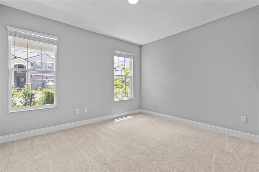 Spacious, unfurnished interior of a new home in Encore at Ovation, Winter Garden (Image 11).