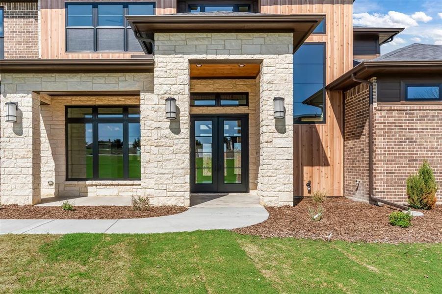 Exterior details and patio area of a home in Eagles Bluff, Hudson Oaks (Image 3).